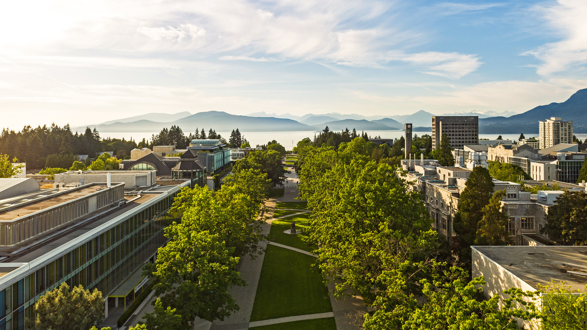 This picture shows the Main Mall at the UBC Vancouver campus looking out towards the Burrard Inlet. 