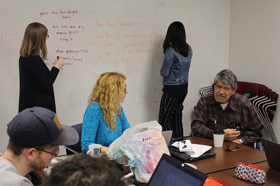Members of the Gitksan Research Lab, and students learning Gitksan, are pictured practising the language.