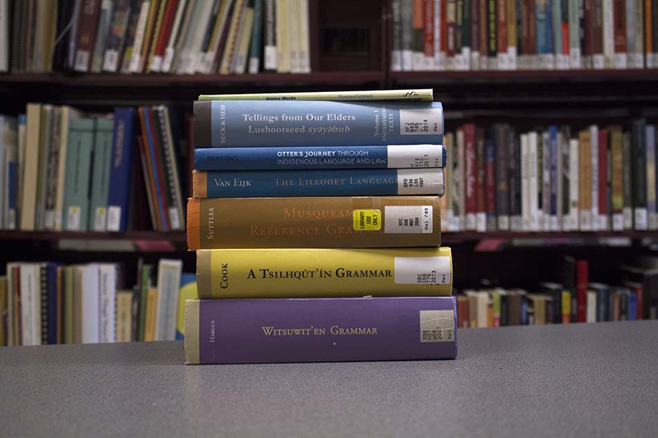 A picture of some of the books in UBC Press’ First Nations Language Series, available at Xwi7xwa Library